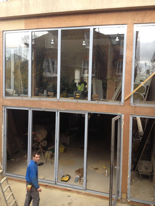 Aluminium bi-fold doors with two-storey glazing in Mayfair