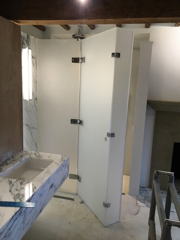 Bespoke frosted glass shower enclosure in Mayfair luxury bathroom